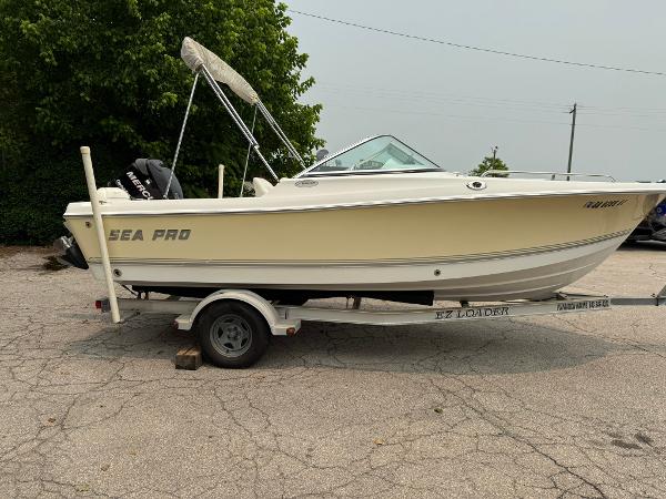 Sea Pro 186 Dual Console 2007 Sea Pro 186 Dual Console boat on trailer, parked outdoors.