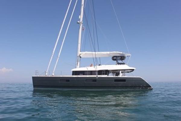 Lagoon 620 2015 Lagoon 620 catamaran sailing on calm blue waters.