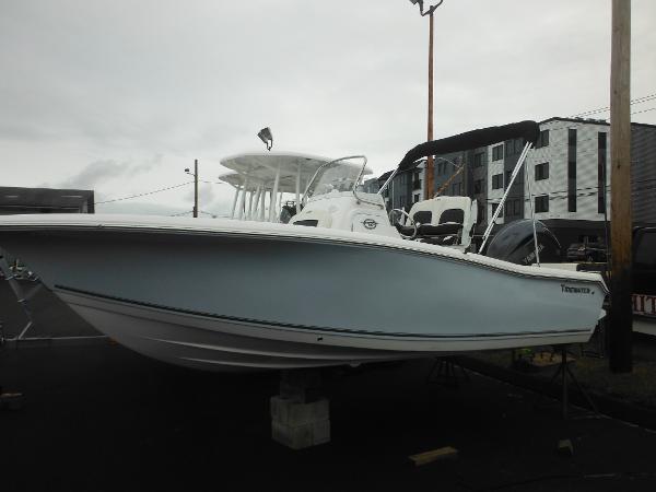 Tidewater 198 CC Adventure 2025 Tidewater 198 CC Adventure boat displayed outdoors on a cloudy day.