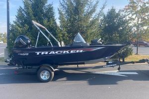 Tracker Pro Guide V-175 Combo 2026 Tracker Pro Guide V-175 Combo boat on trailer, parked outdoors.