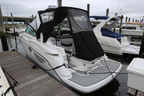 Monterey 295 Sport Yacht 2022 Monterey 295 Sport Yacht docked with black canopy cover.