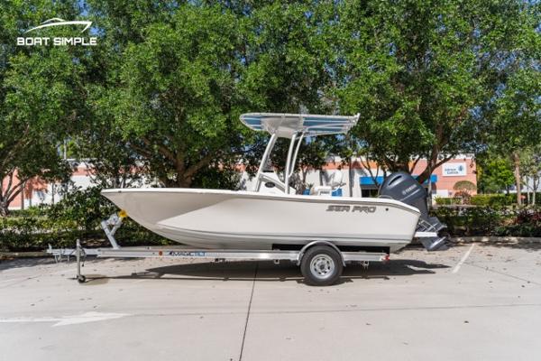Sea Pro 199 Deep V Center Console 2023 Sea Pro 199 Deep V Center Console boat on trailer, parked outdoors.