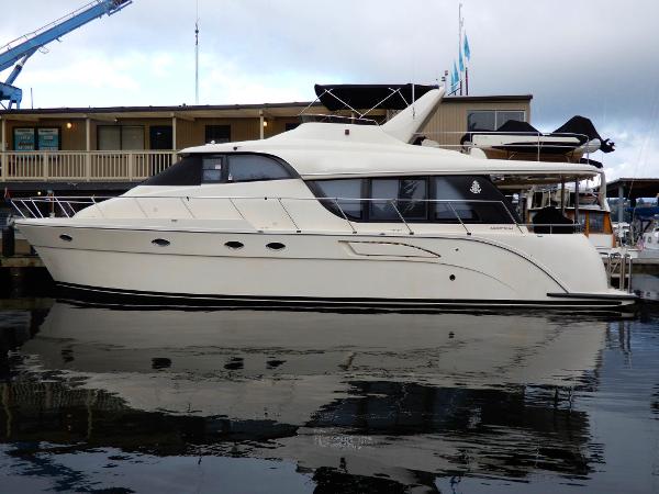 Bracewell Pacesetter 540 2008 Bracewell Pacesetter 540 yacht docked at marina, reflecting on calm water.