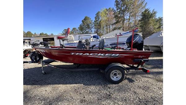 Tracker Super Guide V-16 SC 2021 Tracker Super Guide V-16 SC boat on trailer, parked outdoors.