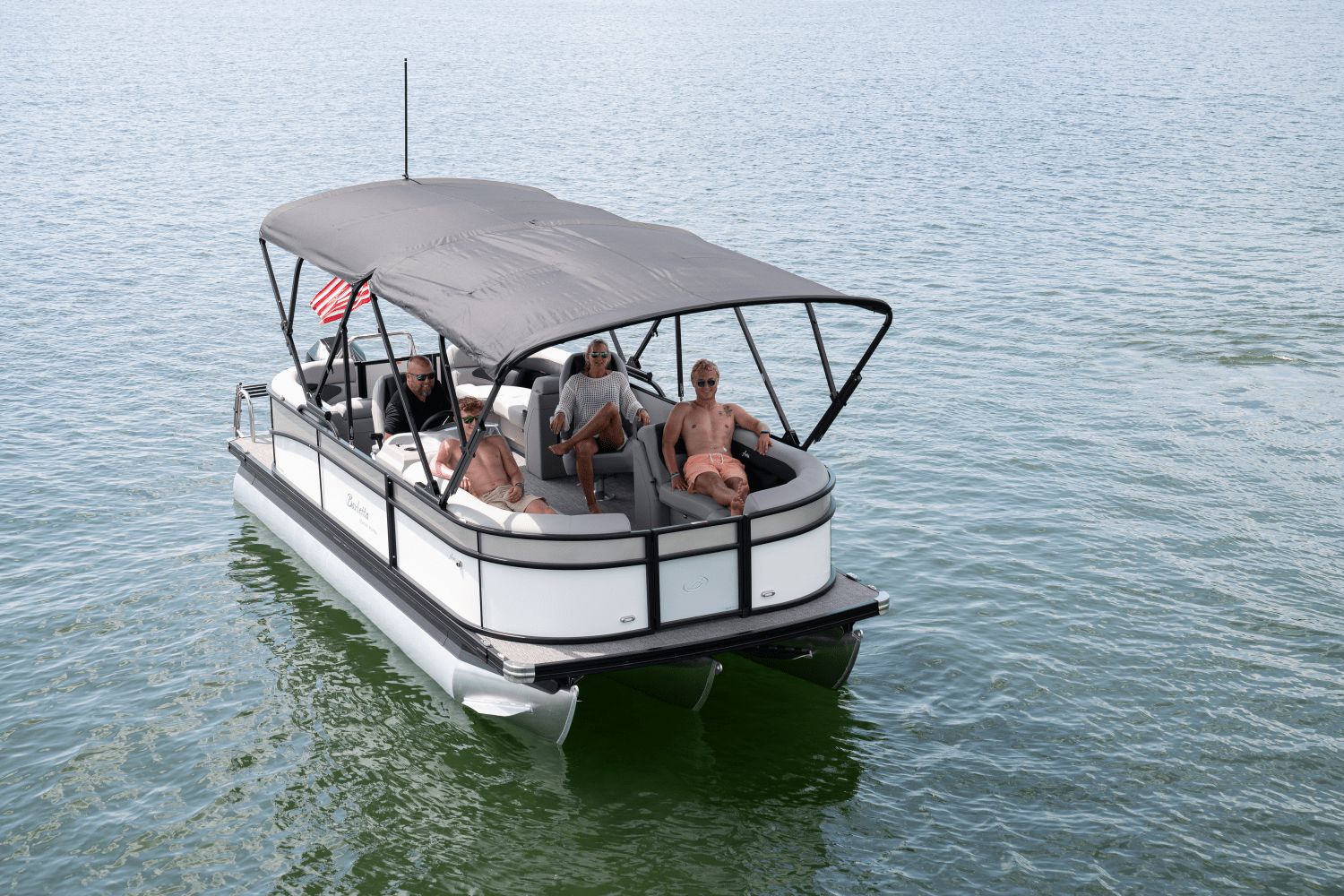 Barletta Aria 22 QC 2026 Barletta Aria 22 QC pontoon boat with passengers on a calm lake.