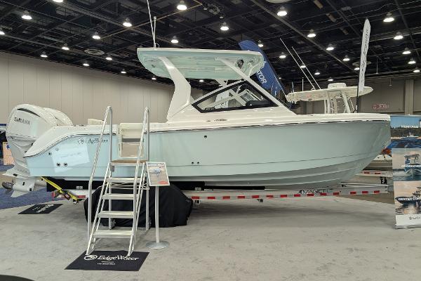 Edgewater 262 CX 2025 Edgewater 262 CX boat displayed indoors with a sleek design and modern features.
