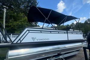 Viaggio Lago V 20 U 2026 Viaggio Lago V 20 U pontoon boat with canopy, parked outdoors.
