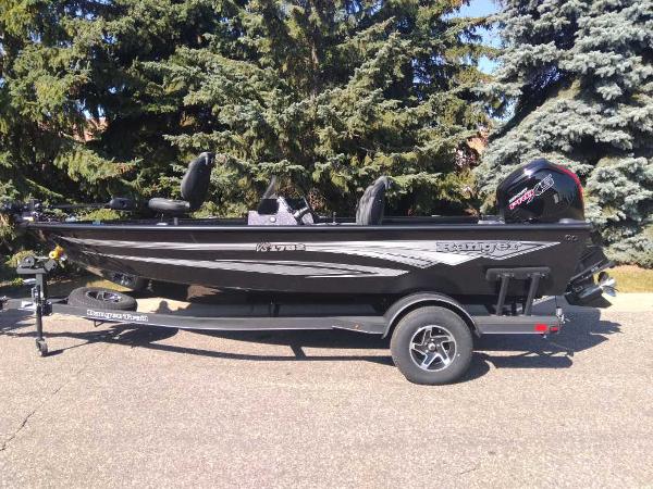 Ranger RT188P 2024 Ranger RT188P fishing boat on trailer, parked outdoors.