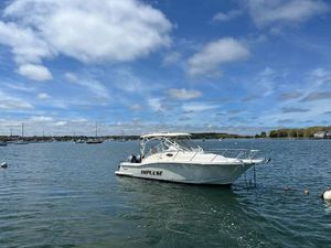 Scout 262 Abaco 2012 Scout 262 Abaco boat named "Impulse" on calm water under blue sky.
