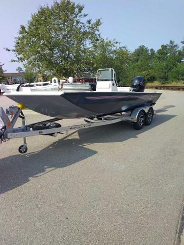 Ranger RB200 2024 Ranger RB200 boat on trailer, parked outdoors.