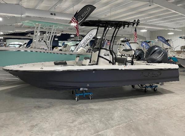 Robalo 206 Cayman 2024 Robalo 206 Cayman boat displayed in a showroom.