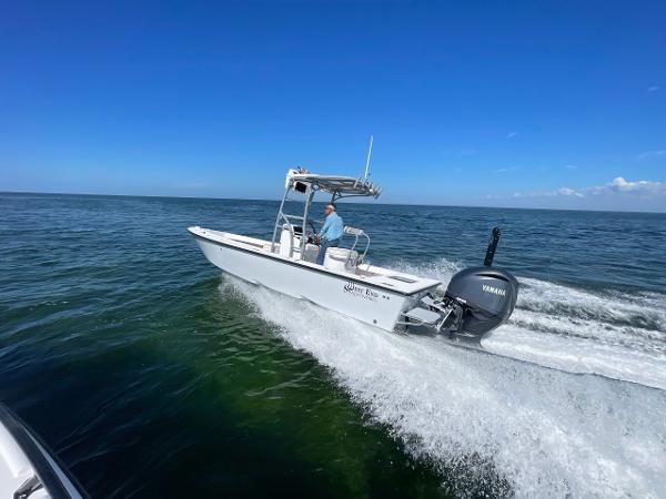 Custom West End Custom West End 2025 boat cruising on open sea with Yamaha engine.