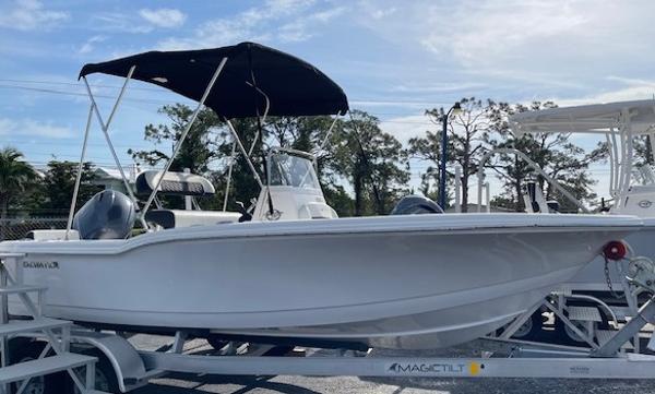 Tidewater 180 CC Adventure 2024 Tidewater 180 CC Adventure boat on trailer with canopy, parked outdoors.