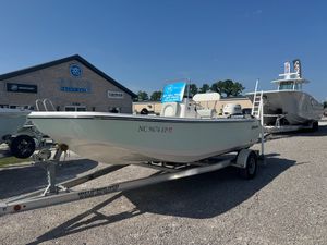 Sundance 20DX 2020 Sundance 20DX boat on trailer at yacht sales dealership.