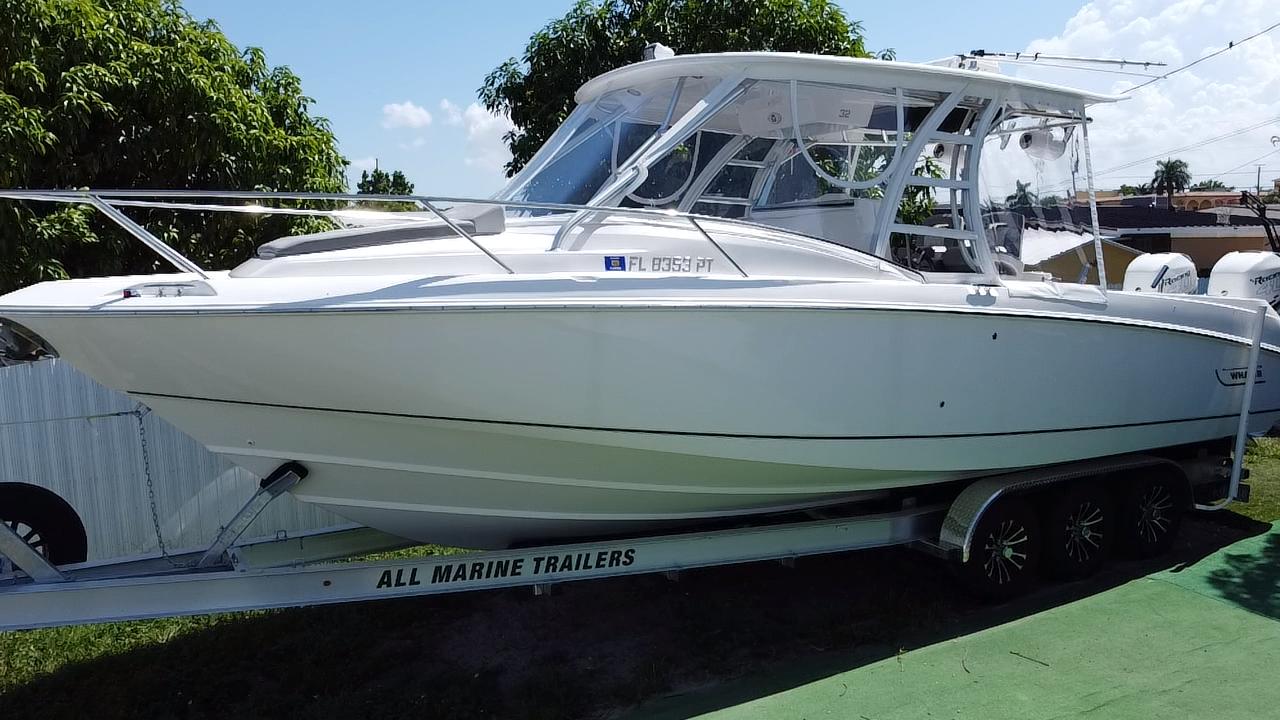 Boston Whaler 320 Outrage Cuddy Cabin 2007 Boston Whaler 320 Outrage Cuddy Cabin on trailer, side view.