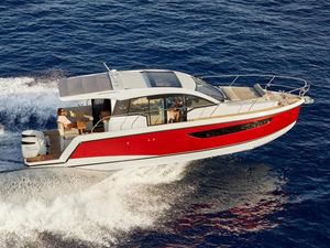 Sealine C335V 2025 Sealine C335V yacht cruising on open water, featuring sleek red and white design.