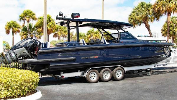 BRABUS Shadow 900 ST 2023 BRABUS Shadow 900 ST boat on a trailer, surrounded by palm trees.