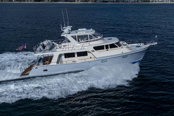 Marlow 53E Explorer 2021 Marlow 53E Explorer yacht cruising on open water, side view.