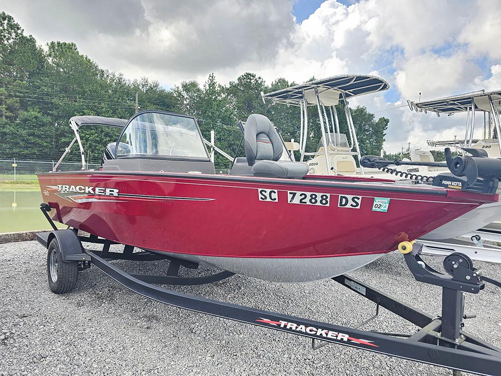Tracker Pro Guide V-175 WT 2022 Tracker Pro Guide V-175 WT boat in vibrant red on a trailer.