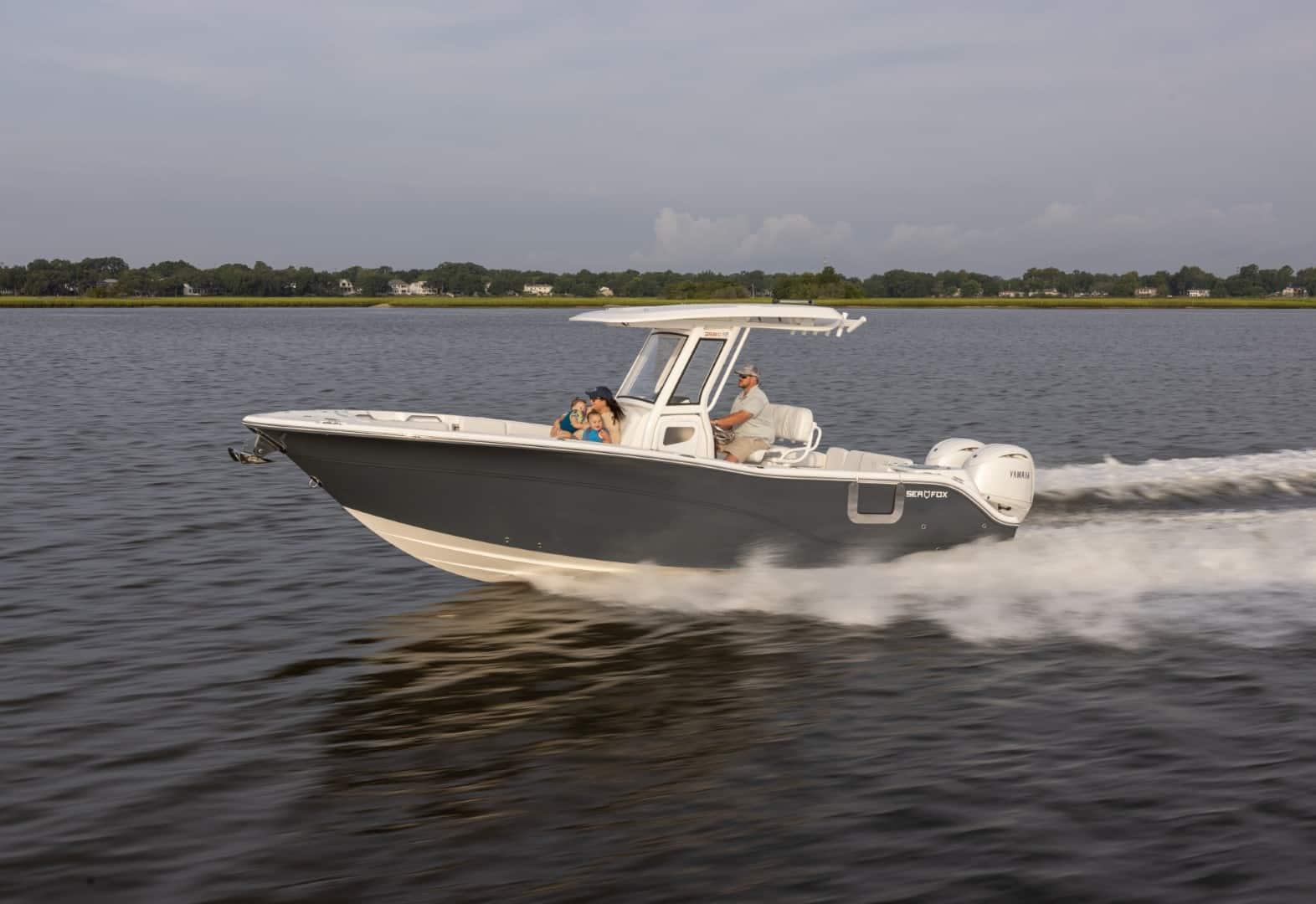 Sea Fox 268 C 2026 Sea Fox 268 C boat cruising on a calm lake.