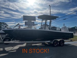 Robalo 246 Cayman 2025 Robalo 246 Cayman boat on trailer, available at Yamaha sales service.