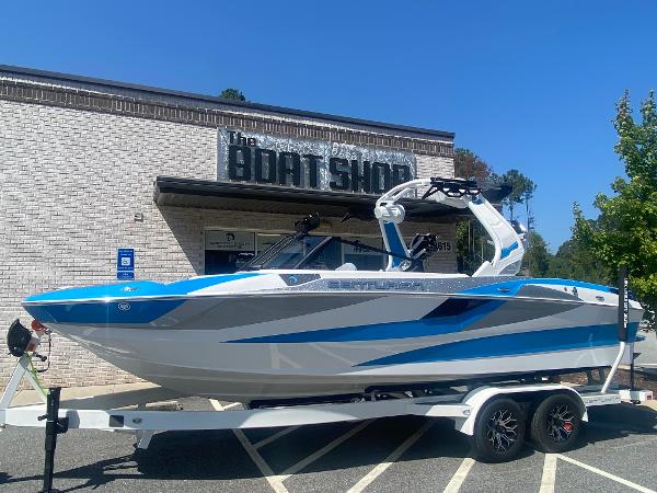 Centurion Fe23 2025 Centurion Fe23 boat in blue and white, parked outside The Boat Shop.