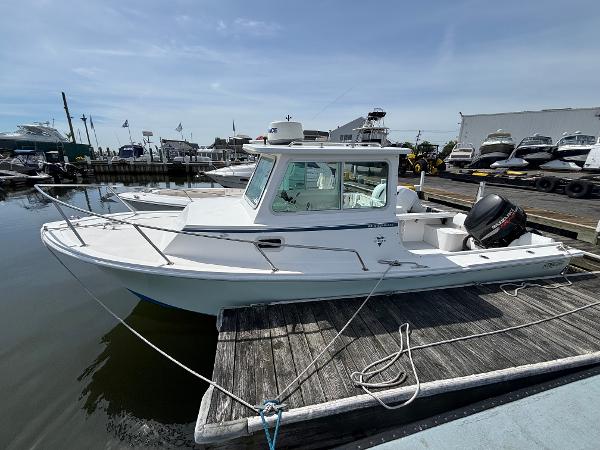 Steiger Craft 23 Chesapeake Miami 2006 Steiger Craft 23 Chesapeake Miami boat docked at marina.
