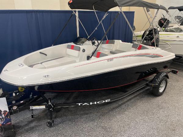 Tahoe T16 2024 Tahoe T16 boat with sleek design, black hull, and red accents on display.