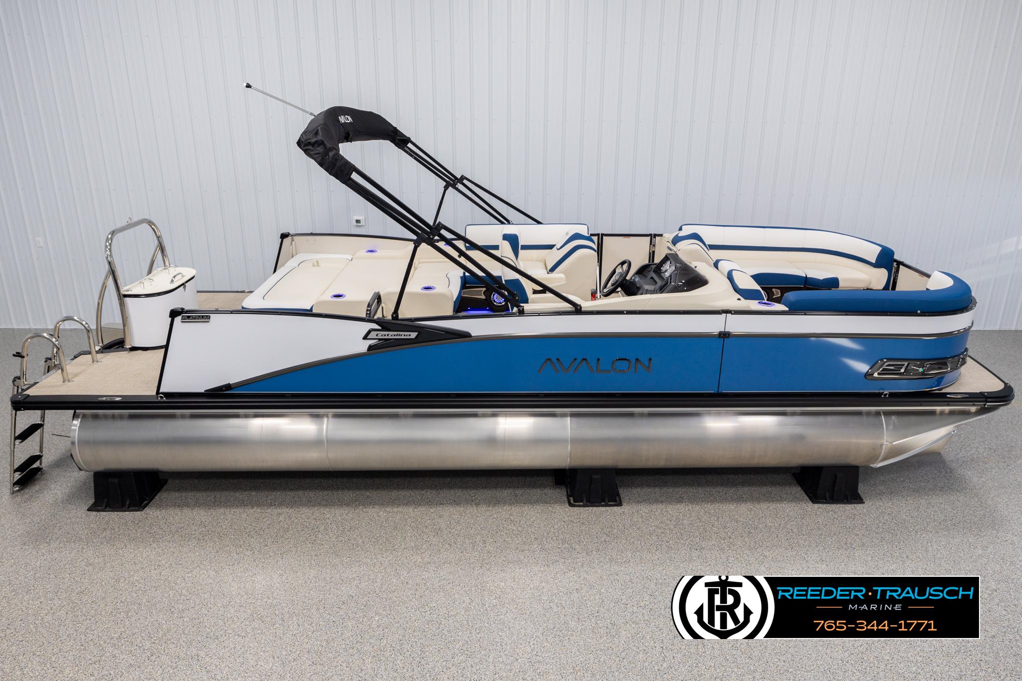 Avalon Catalina VRB 2025 Avalon Catalina VRB pontoon boat with blue and white design in showroom.