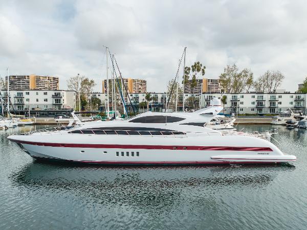 Mangusta Mangusta 105 Sport 2004 Mangusta 105 Sport yacht docked in marina, modern design, sleek profile, urban backdrop.
