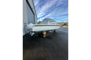 Nimbus Weekender 9 2020 Nimbus Weekender 9 boat on stands, parked outdoors near a large building.