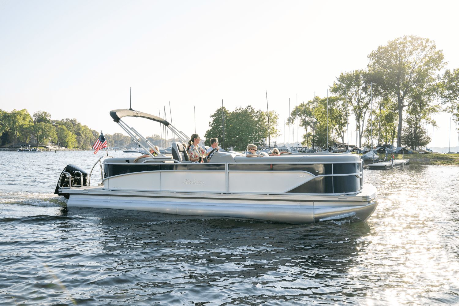Barletta Cabrio 22 QC 2026 Barletta Cabrio 22 QC pontoon boat cruising on a sunny lake.