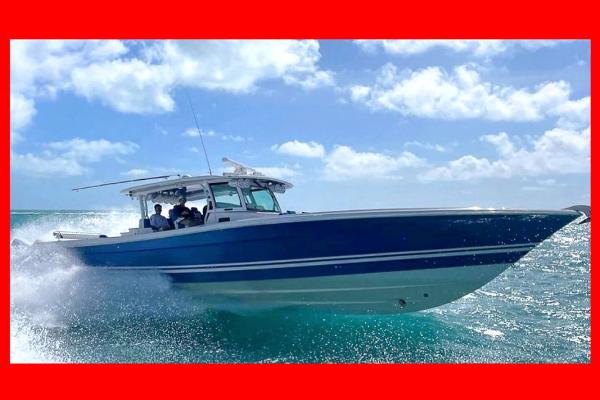 Hydra-Sports 5300 Suenos 2018 Hydra-Sports 5300 Suenos boat cruising on ocean waves under a clear sky.