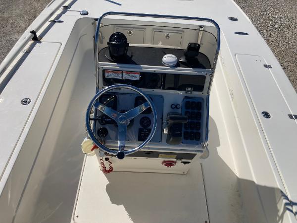 Sterling 2250XS 2011 Sterling 2250XS boat console with steering wheel and control panel.