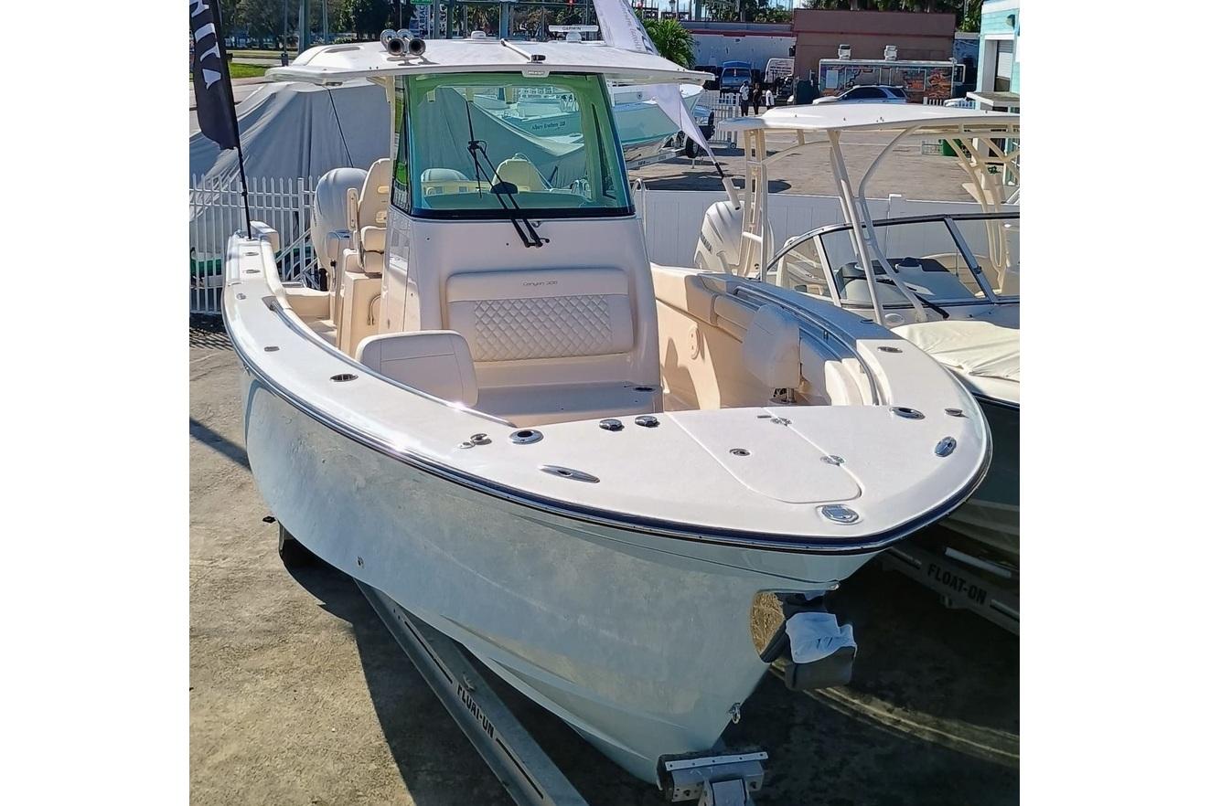 Grady-White Canyon 306 2025 Grady-White Canyon 306 boat displayed at a marina.