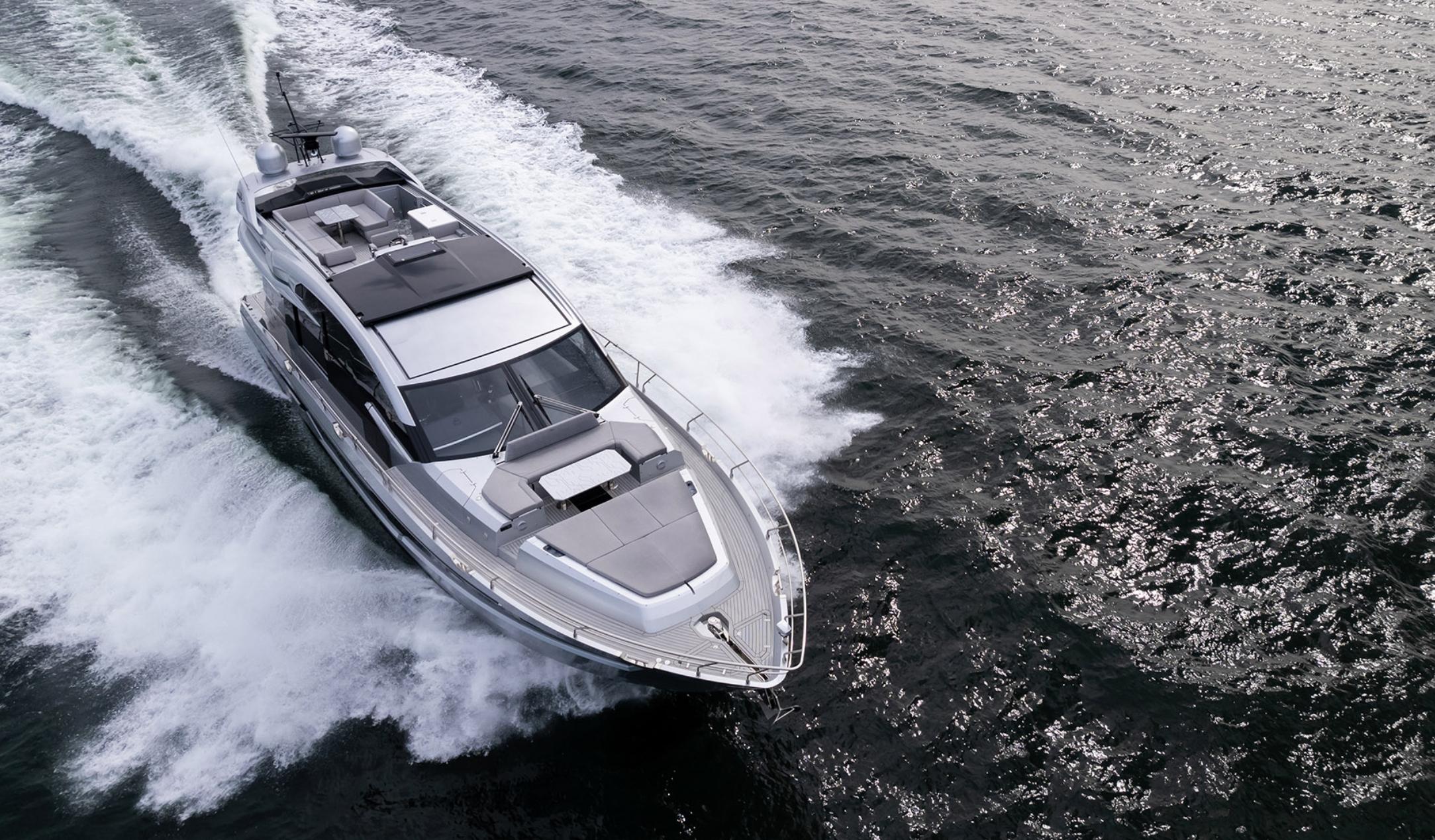 Galeon 700 Sky 2026 Galeon 700 Sky yacht cruising on open water, aerial view.
