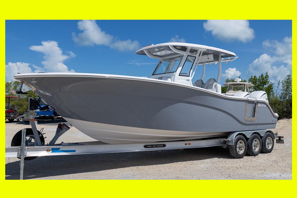 Sea Fox 288 Commander 2026 Sea Fox 288 Commander boat on trailer, parked outdoors under blue sky.
