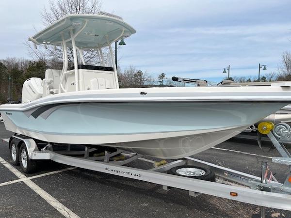 Ranger 2600 Bay 2025 Ranger 2600 Bay boat on trailer, parked outdoors, showcasing sleek design and modern features.