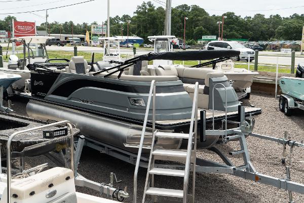 Silver Wave 2410 SW3 CLS 2023 Silver Wave 2410 SW3 CLS pontoon boat on display at a dealership.