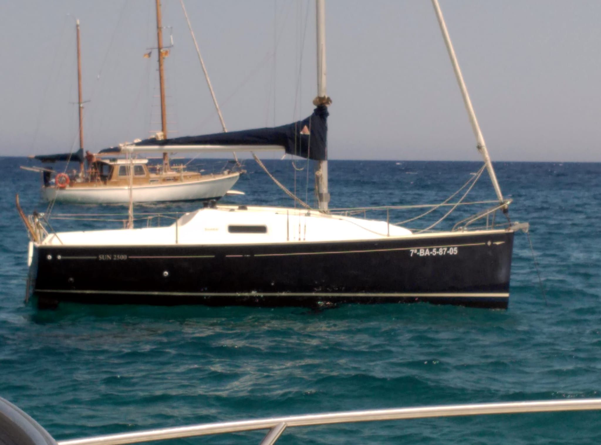 Jeanneau Sun 2500 Jeanneau Sun 2500 sailboat from 2001 on calm blue sea.