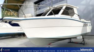 Ocqueteau Espace 610 Ocqueteau Espace 610 boat, 1991 model, displayed in a marina setting.
