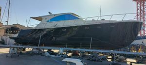 Cantieri Estensi Goldstar 540 s 2006 Cantieri Estensi Goldstar 540 s yacht on dry dock, side view.
