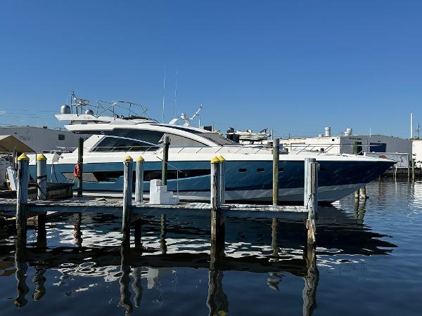 Cheoy Lee Alpha 87 Express Sportbridge 2014 Cheoy Lee Alpha 87 Express Sportbridge yacht docked at marina.