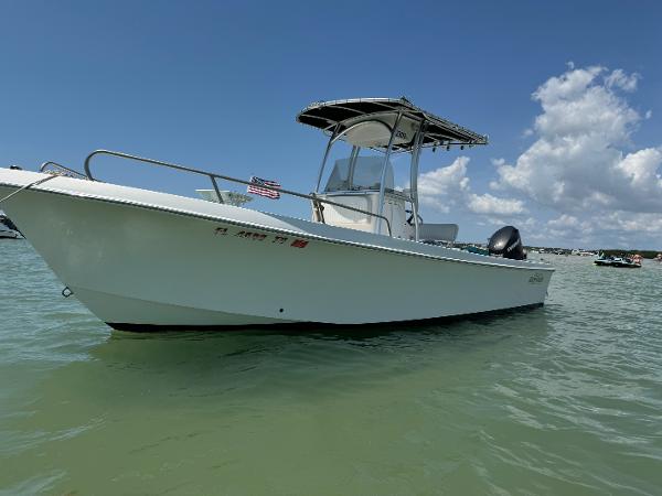 May-Craft 2300CCX 2017 May-Craft 2300CCX boat on calm water under blue sky.