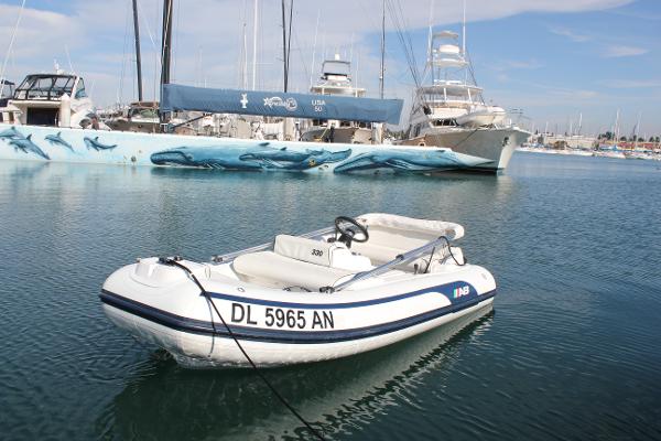 AB Inflatables ABJET 330 2022 AB Inflatables ABJET 330 boat docked in marina with yachts.