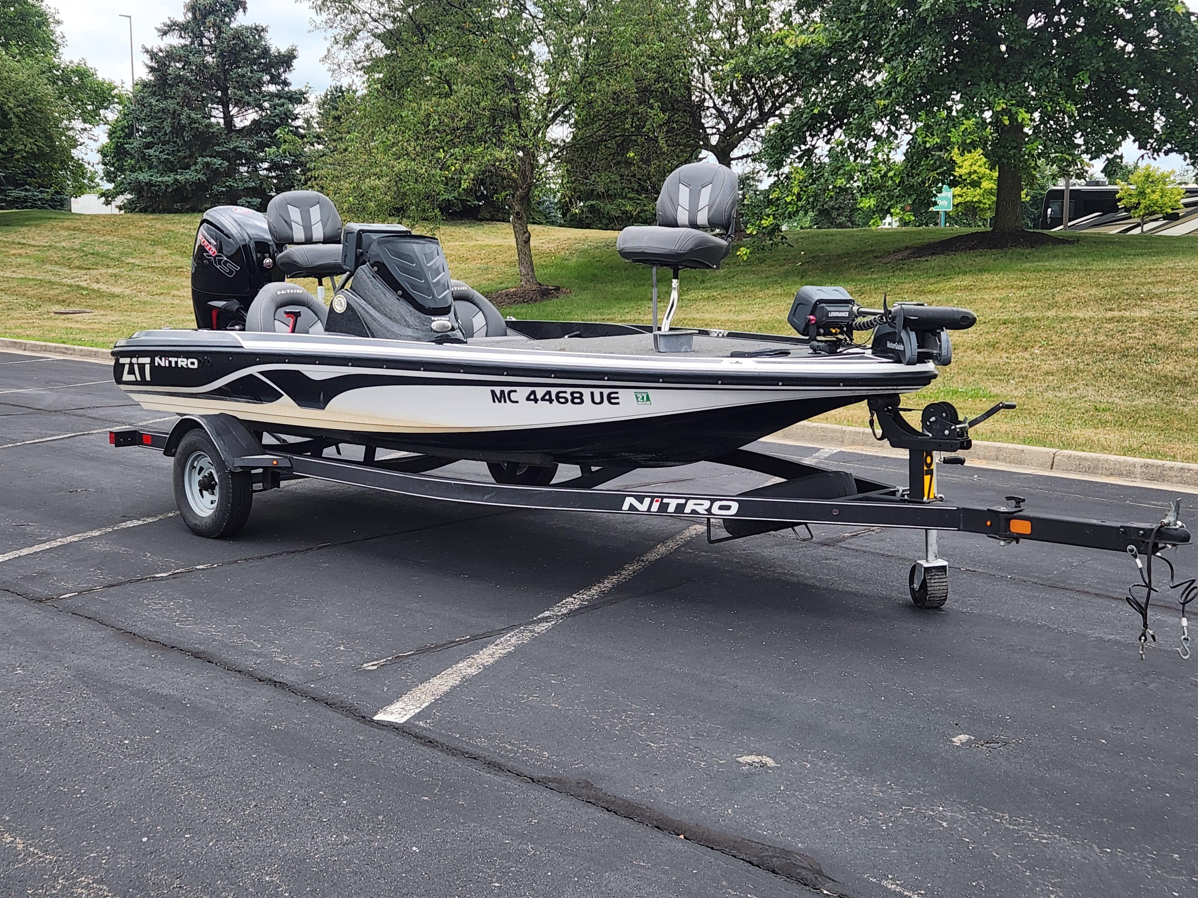 Nitro Z17 2017 Nitro Z17 fishing boat on trailer in parking lot.