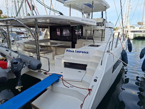Leopard 45 Leopard 45 catamaran, 2019 model, docked at marina with visible name "Prince Laurence".