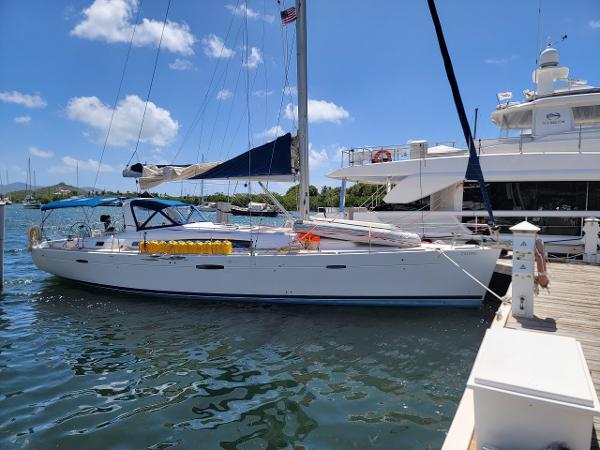 Beneteau Oceanis 50 2011 Beneteau Oceanis 50 sailboat docked under clear blue sky.