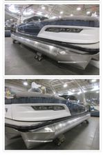 Avalon Excalibur LTD Quad Lounge Windshield 2024 Avalon Excalibur LTD Quad Lounge Windshield pontoon boat in showroom.
