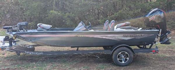 Ranger RT188P 2025 Ranger RT188P fishing boat on trailer, parked outdoors.